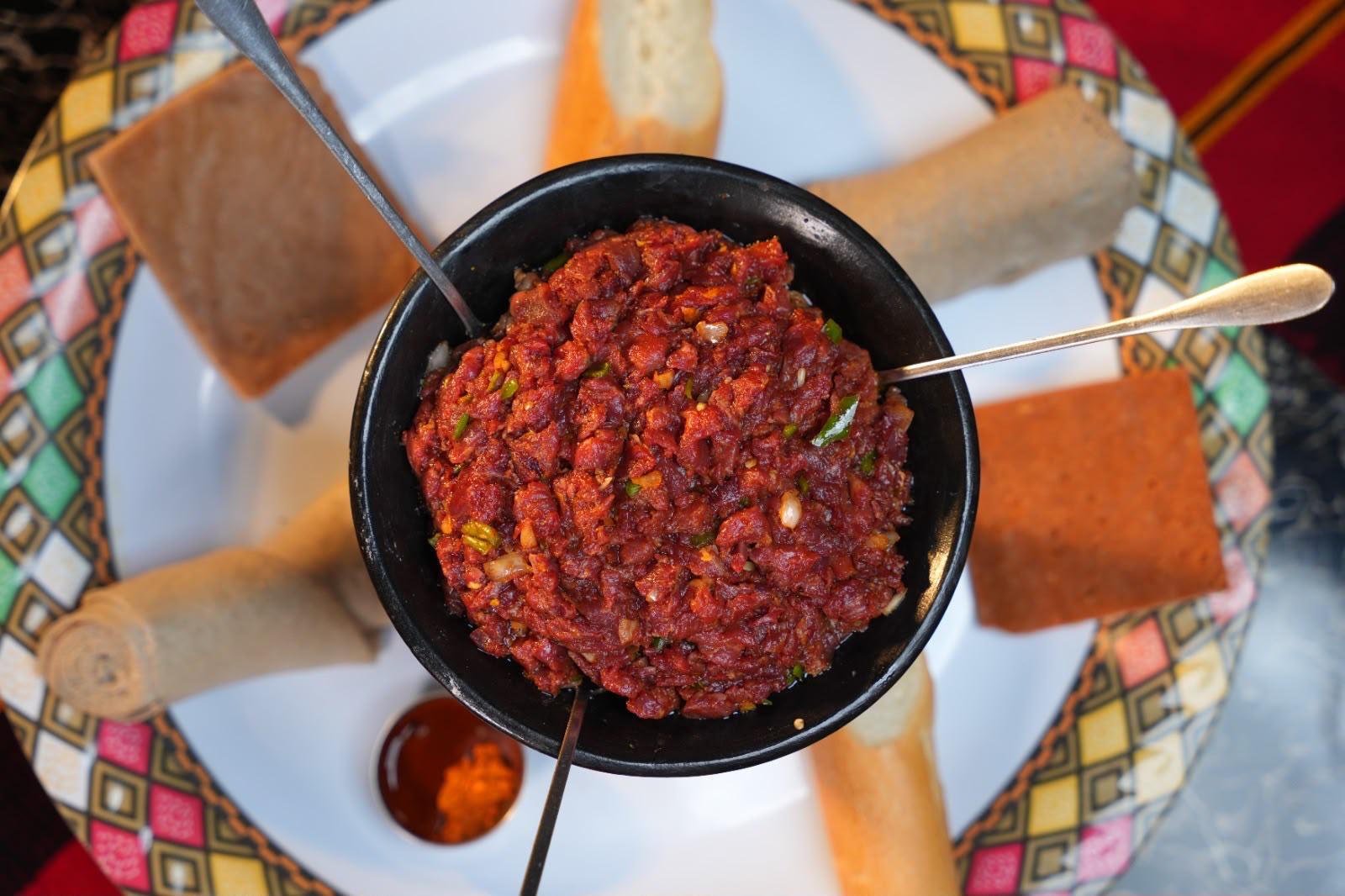 Kitfo served with injera and spice